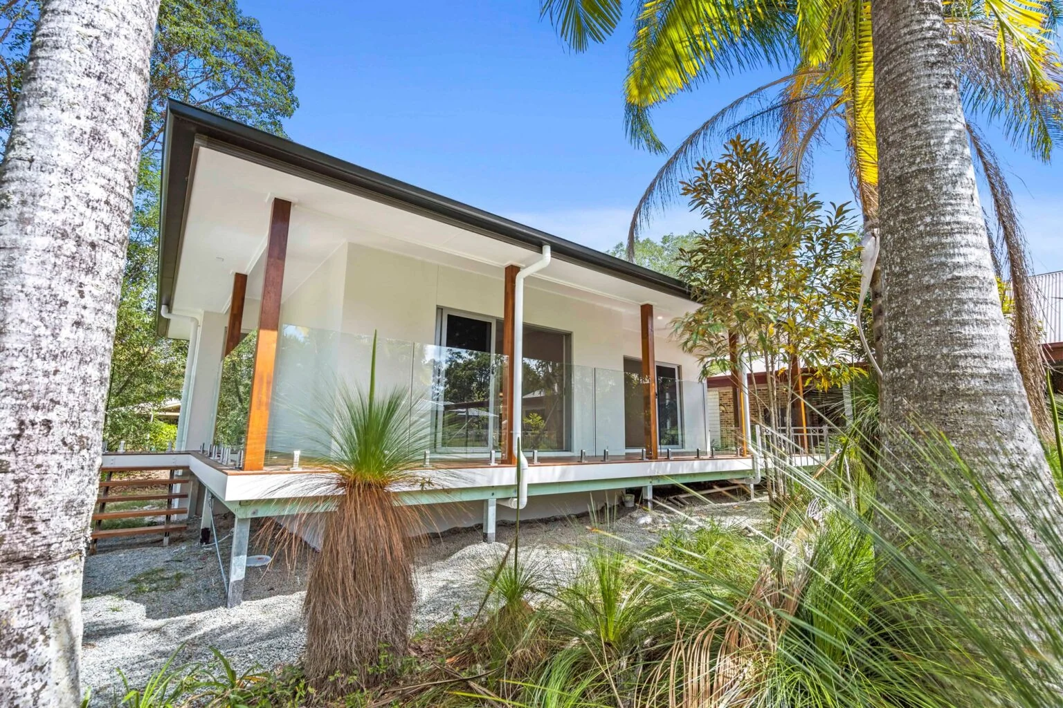 Exterior of the home viewed through the native garden at the Ney Road renovation, Capalaba