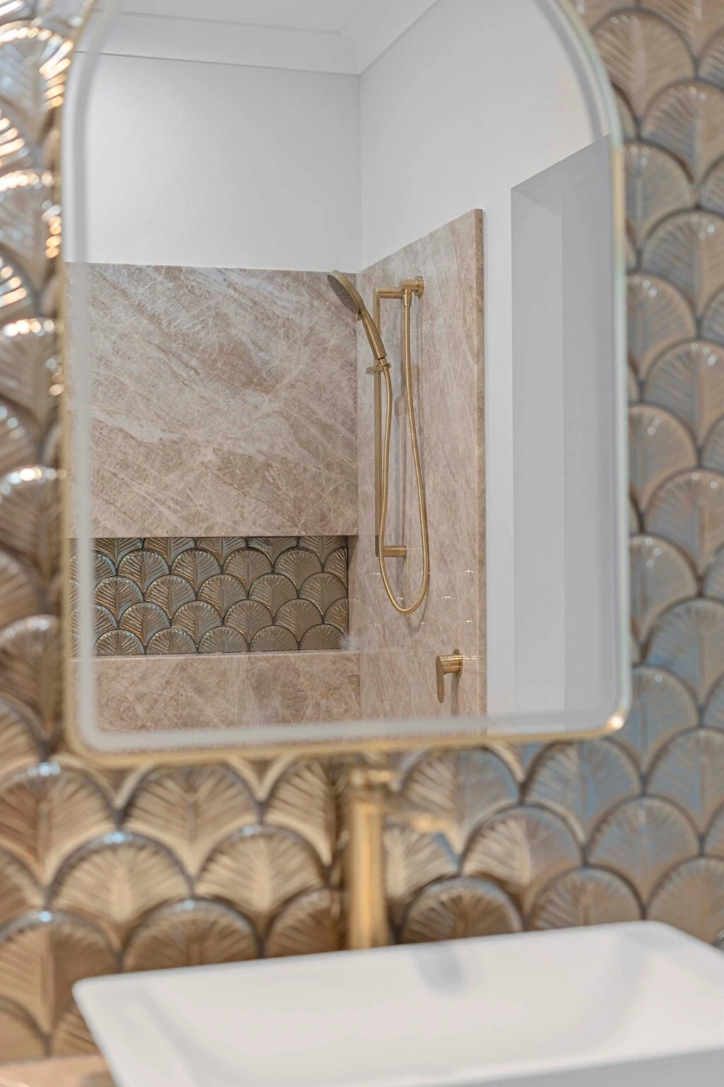 Bathroom mirror reflecting the feature-tiled shower at the Ney Road renovation, Capalaba