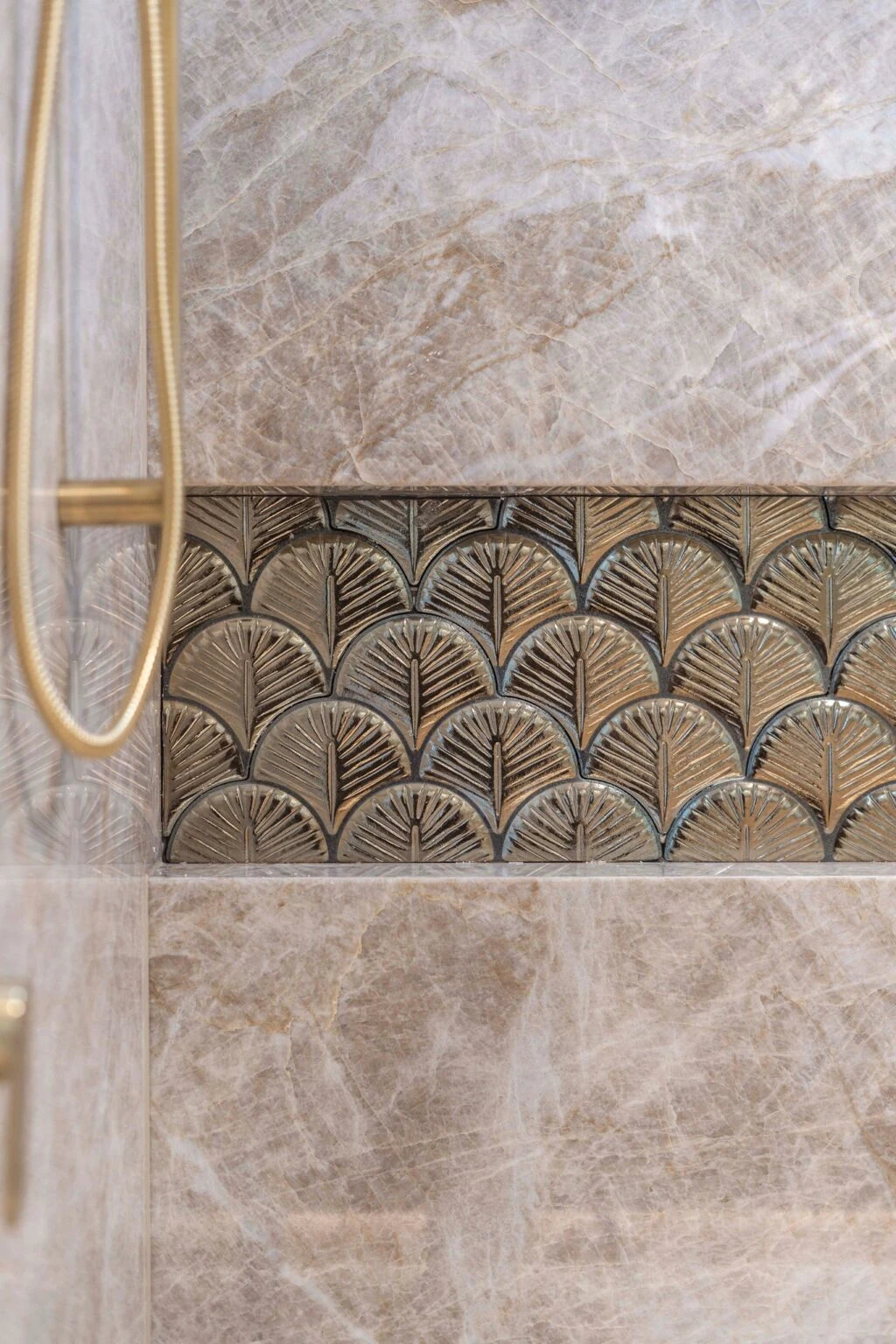 Decorative fan-pattern feature tile in the bathroom at the Ney Road renovation, Capalaba