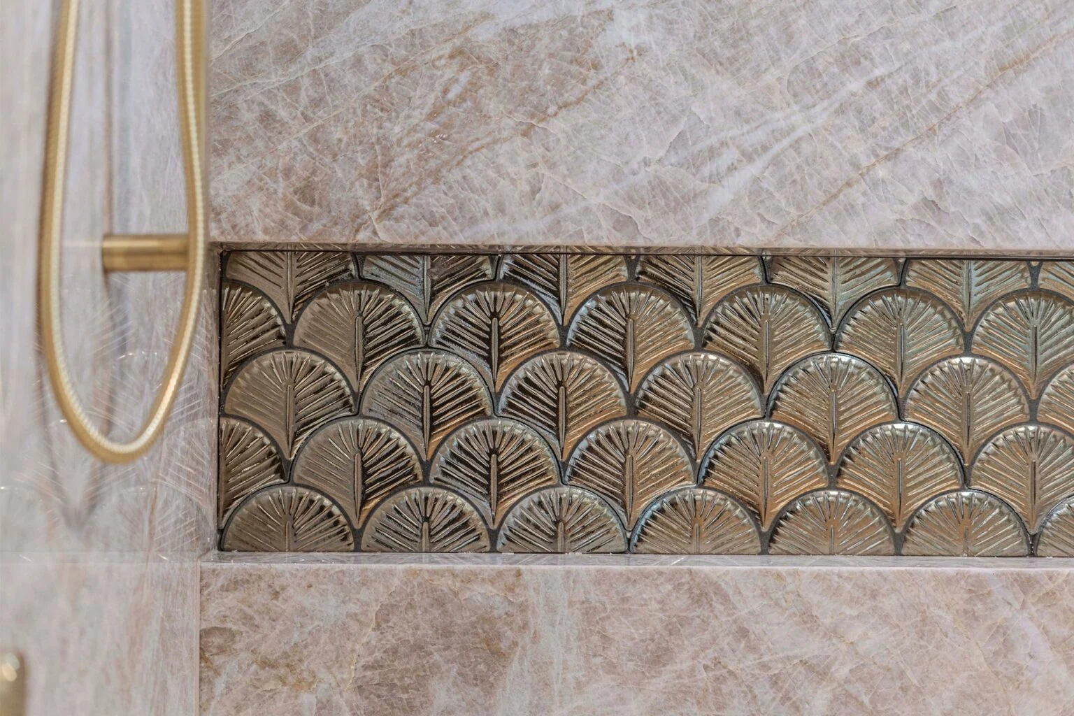 Fan-pattern feature tile beside the shower fittings at the Ney Road renovation, Capalaba